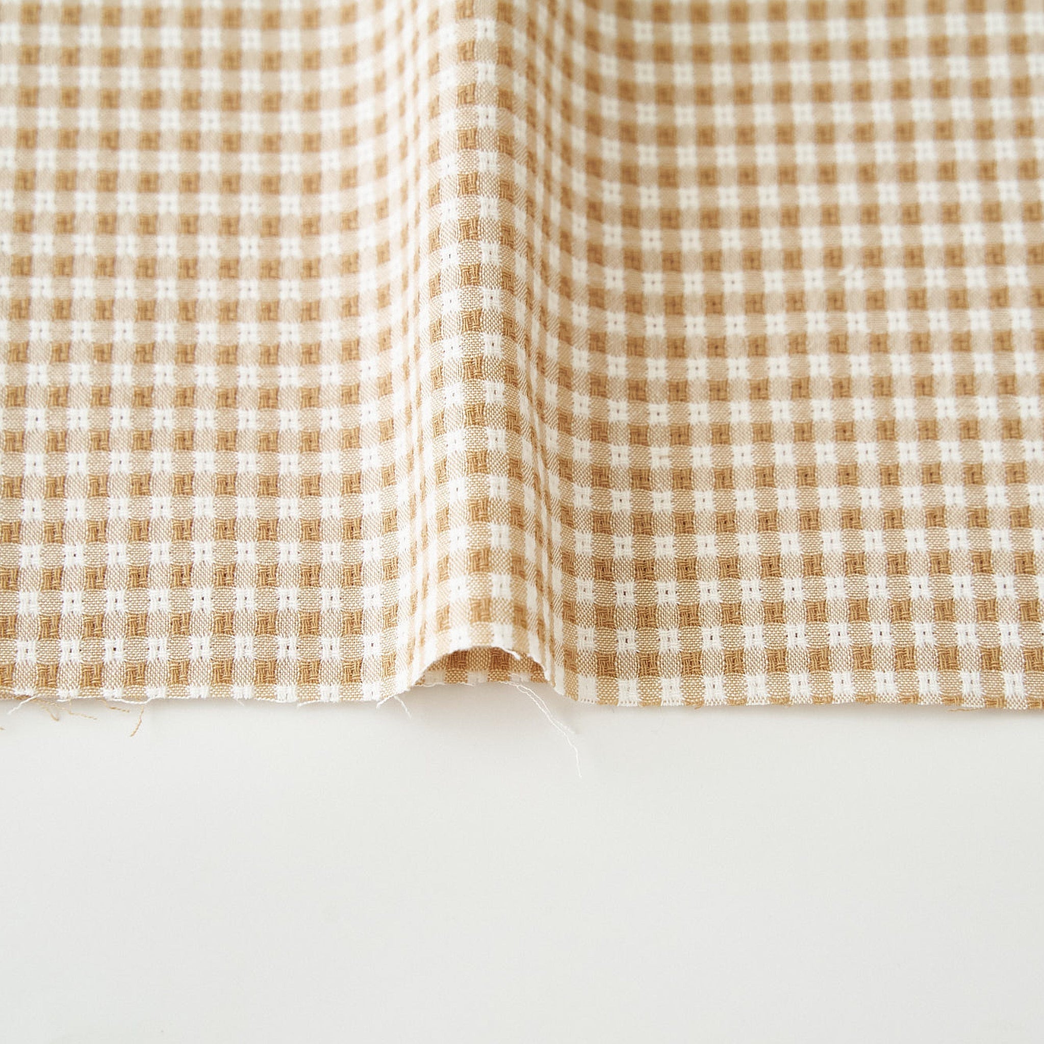 綿ポリ交織ドビーギンガムチェック#107ベージュ