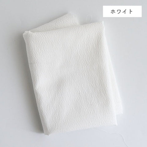 白いポリエステル生地の表面